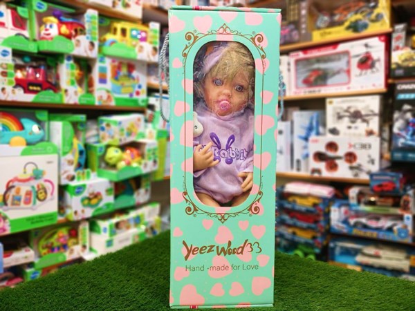 عروسک سیلیکونی دختر بچه 50 سانتی لباس یاسی همراه با وسایل_اسباب بازی عروسک دخترانه