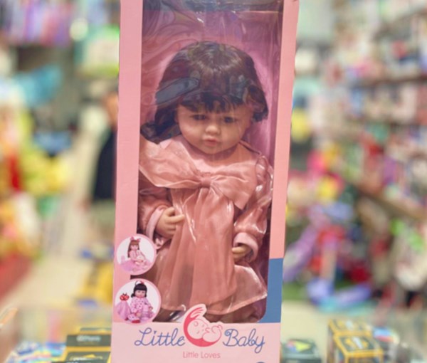 عروسک سیلیکونی دختر بچه 50 سانتی سخنگو با کلاه صورتی_اسباب بازی عروسک دخترانه