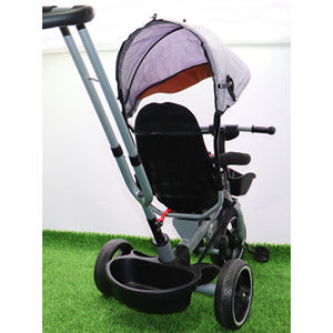 سه چرخه فلزی با سایه بان رنگ طوسی